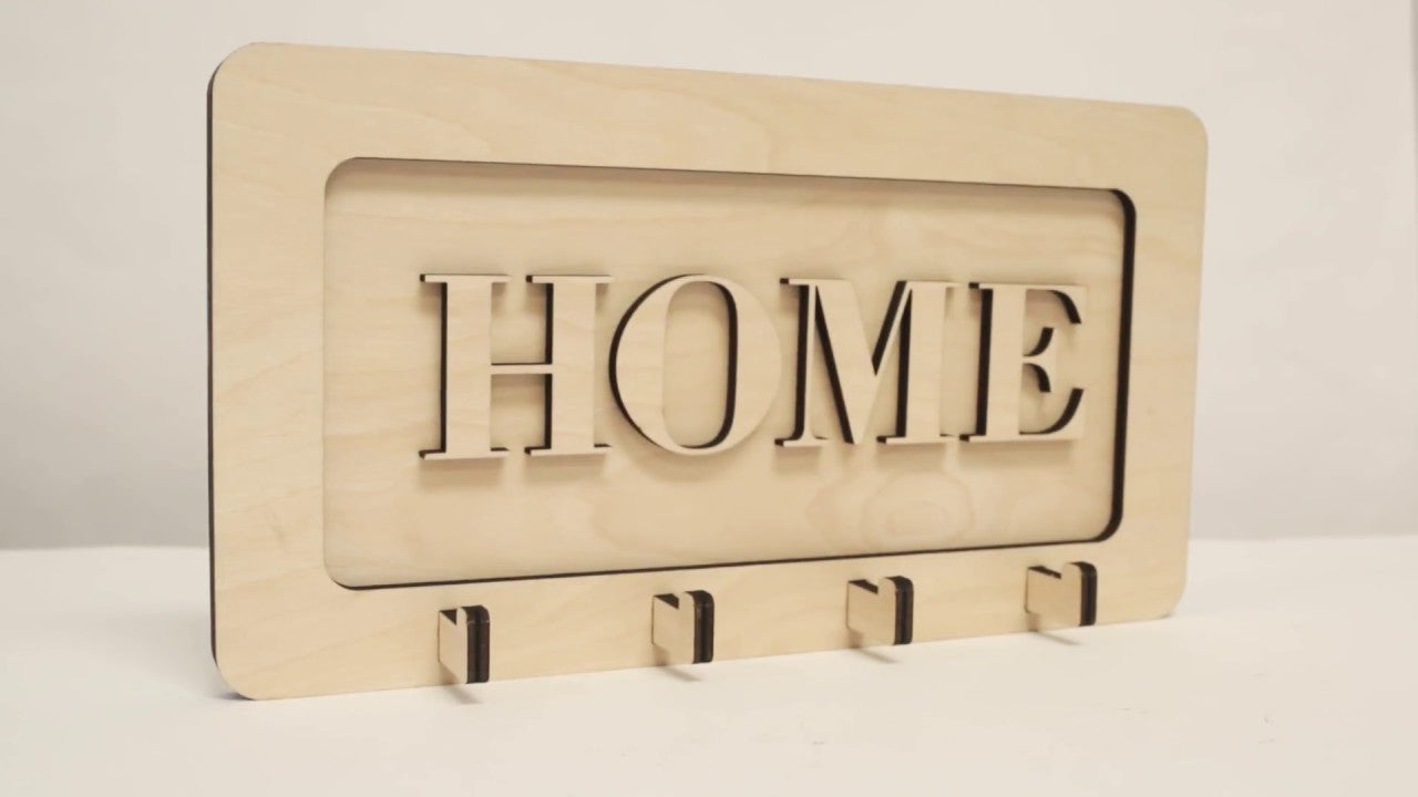 Easily customize this laser cut wooden key holder to your liking by changing the size, fonts, message, etc