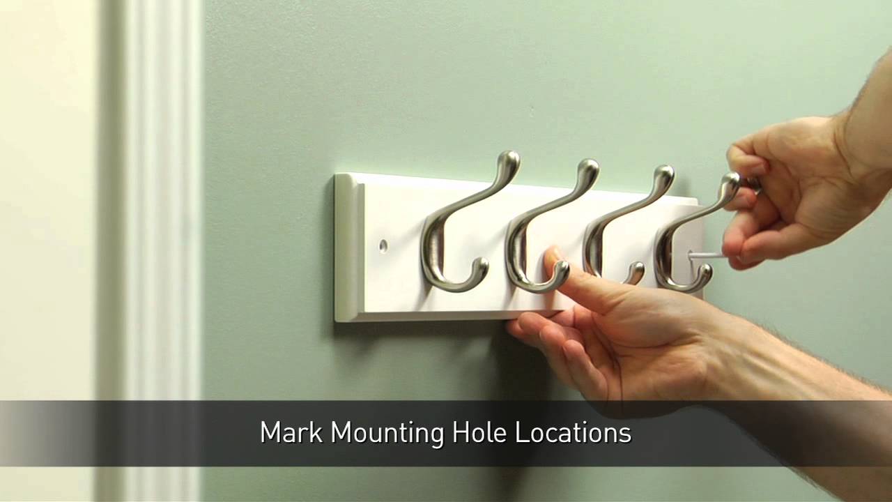 This step-by-step video shows how to level and install a hook rail for coats and hats and what tools you will need to complete the job