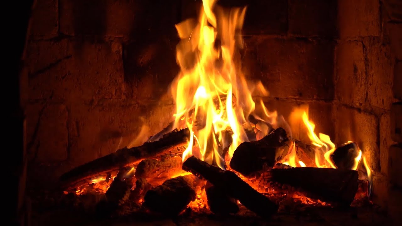 Instrumental Christmas music with a fireplace's crackling fire sounds 24/7