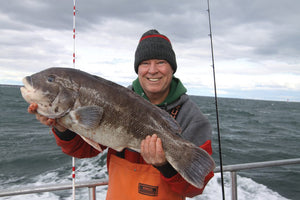 The author hefts a 15-pound blackfish taken on a party boat in Long Island Sound